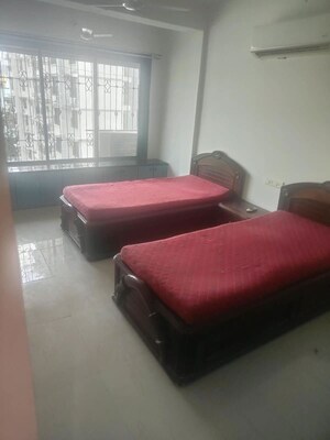 Bedroom in 2 BHK Apartment at Neet Kirtan CHS, Andheri West – for Rent