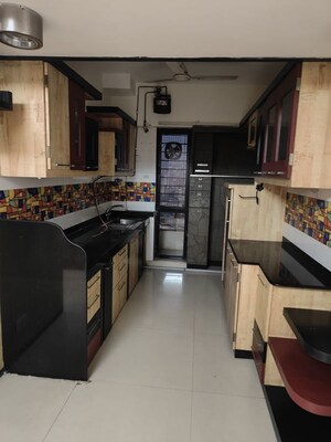 Kitchen in 2.5 BHK Apartment at Siddhachal Apartment 8, Vasant Vihar – for Rent