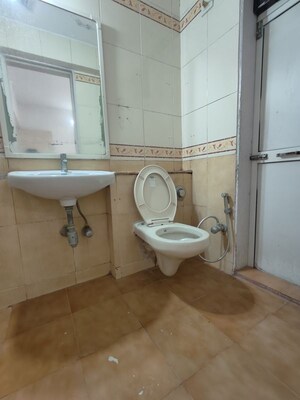 Bathroom in 3 BHK Apartment at Jasmine Tower, Vasant Vihar – for Rent