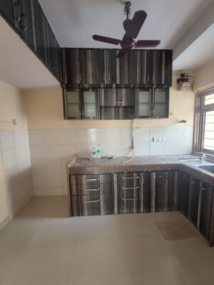 Kitchen in 3 BHK Apartment at Jasmine Tower, Vasant Vihar – for Rent