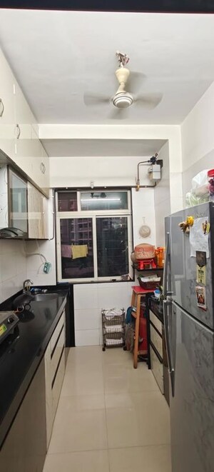 Kitchen in 1 BHK Apartment at Thakur Gayatri Satsang, Kandivali East – for Rent