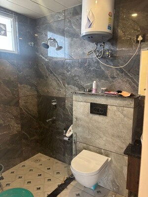 Bathroom in 3 BHK Builder Floor at Canal Road – for Rent