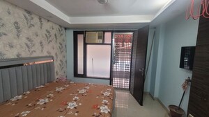 Bedroom in 3 BHK Builder Floor at Rajouri Garden – for Rent