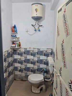 Bathroom in 2 BHK Builder Floor at Rajpur Khurd Extension – for Rent