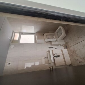 Bathroom in 1 BHK Apartment at Puranik Rumah Bali, Ghodbunder Road – for Rent