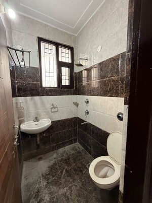 Bathroom in 2 BHK Apartment at Shri Devaji Residency, Dhakoli – for Sale
