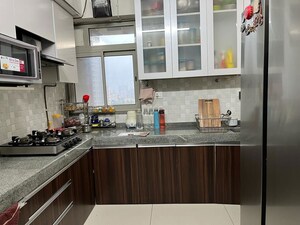 Kitchen in 4 BHK Apartment at Rajesh White City, Kandivali East – for Rent