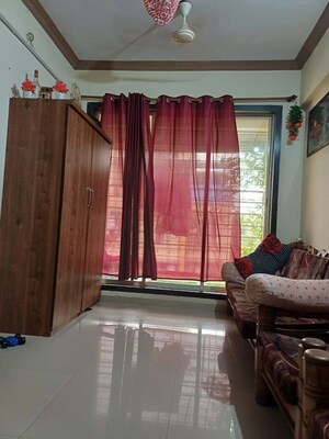 Living Room in 1 BHK Apartment at Shakti Dham Apartments, Ghansoli – for Rent