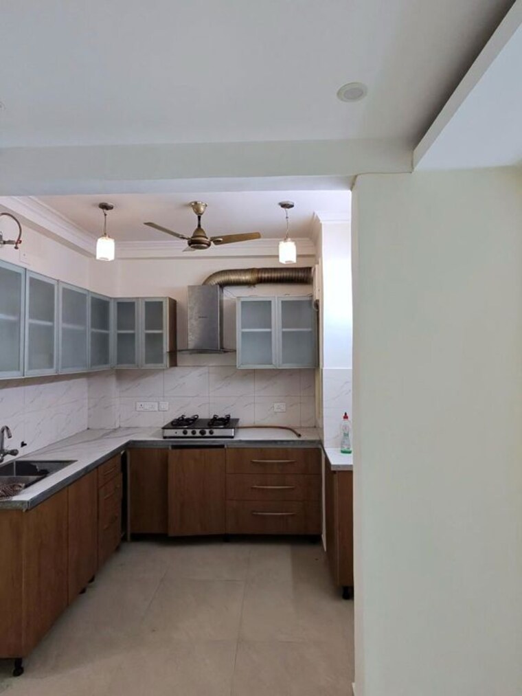 Kitchen, chittaranjan park 3 Bedroom 1500 Sq.Ft. Builder Floor In Chittaranjan Park Delhi 10656973