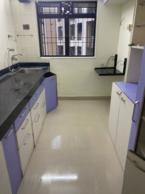Kitchen in 2 BHK Apartment at Cosmos Paradise Complex, Thane West – for Rent