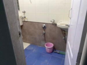 Bathroom in 2 BHK Apartment at Cosmos Paradise Complex, Thane West – for Rent