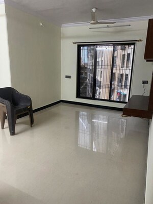 Living Room in 2 BHK Apartment at Cosmos Paradise Complex, Thane West – for Rent