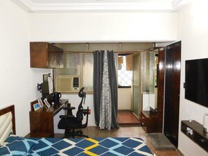 Living Room in 2 BHK Apartment at RNA Heights, Andheri East – for Sale