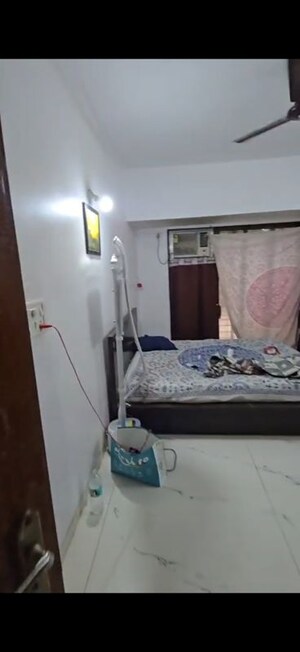 Bedroom in 2 BHK Apartment at Goyal Green Woods, Andheri East – for Rent