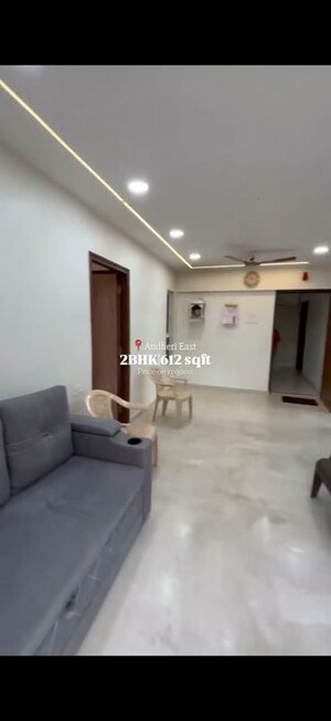Living Room in 2 BHK Apartment at Romell Orbis, Andheri East – for Sale