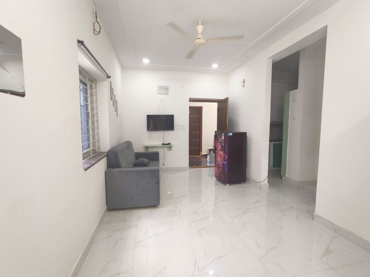 Living Room, nine-nines-swara-apartment 1 Bedroom 856 Sq.Ft. Apartment In Kondapur Hyderabad 10657235