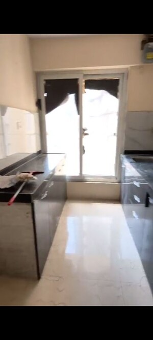 Kitchen in 1 BHK Apartment at Ruparel Elara, Kandivali West – for Rent
