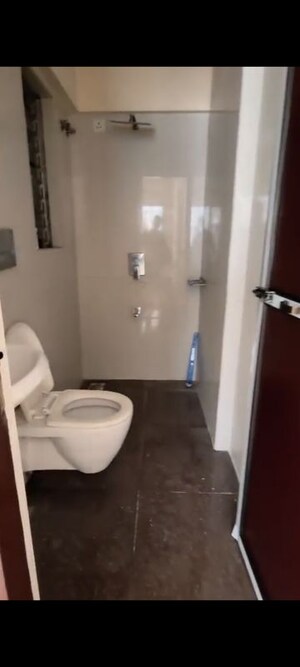 Bathroom in 1 BHK Apartment at Ruparel Elara, Kandivali West – for Rent
