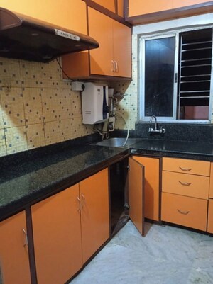Kitchen in 3 BHK Apartment at Deeshari V, Purbalok – for Sale