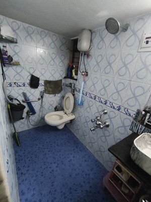 Bathroom in 1 BHK Apartment at Sonal Link Residency, Malad West – for Rent