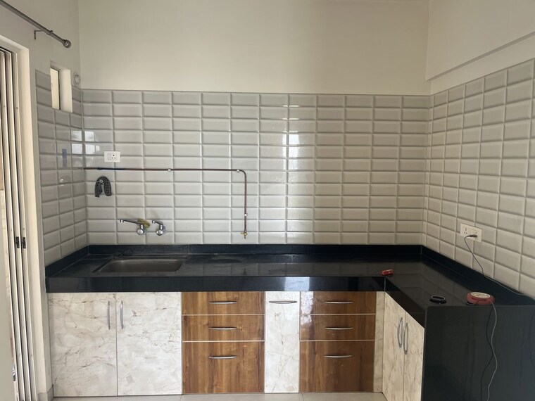 Kitchen, nyati-era 2 Bedroom 781 Sq.Ft. Apartment In Dhanori Pune 10657468