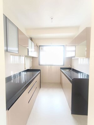 Kitchen in 2 BHK Apartment at Rustomjee Seasons, Bandra East – for Sale