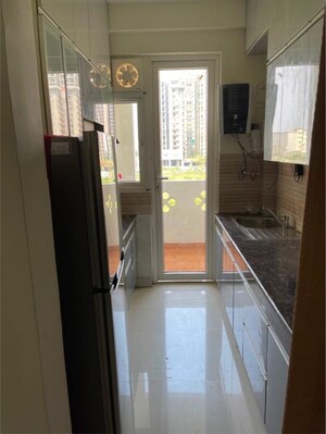 Kitchen in 2 BHK Apartment at Radhey Krishna Casa Green I, Sector 16 Greater Noida – for Rent