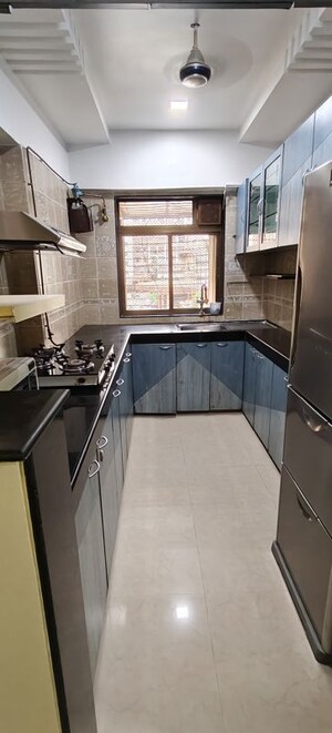 Kitchen in 2 BHK Apartment at Nirmal Lifestyle Residency CHS Ltd, Mulund West – for Rent