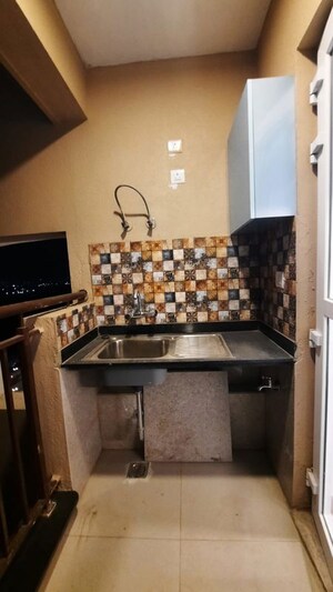 Kitchen in 2.5 BHK Apartment at Ahad Serenity, Rayasandra – for Rent