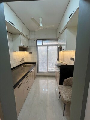 Kitchen in 1 BHK Apartment at Thanekar BKC Paramount, Katrap – for Sale