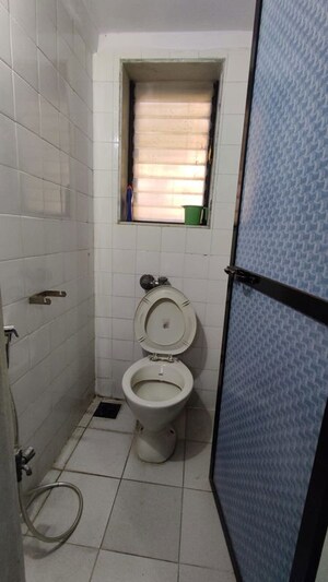 Bathroom in 1 BHK Apartment at Bhoomi Park II, Malad West – for Rent