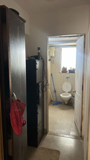 Bathroom in 2 BHK Apartment at Bhaskar Nivas, Yari Road – for Rent