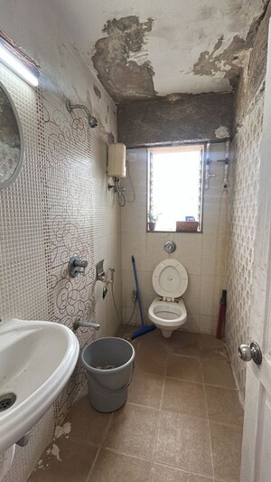 Bathroom in 2 BHK Apartment at Manish Kaveri CHS, Andheri West – for Rent