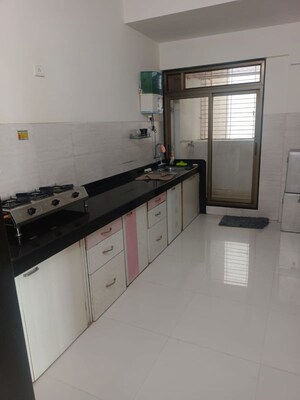 Kitchen in 2 BHK Apartment at Sadguru Complex II, Goregaon West – for Rent