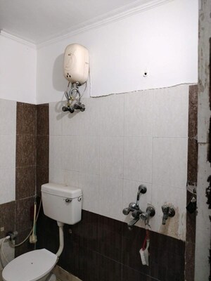Bathroom in 3 BHK Builder Floor at Mahavir Enclave 1 – for Rent