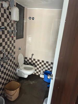 Bathroom in 1 BHK Apartment at Heena Presidency, Mira Road – for Rent