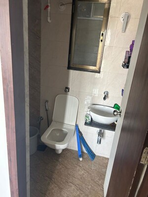 Bathroom in 1 BHK Apartment at Heena Presidency, Mira Road – for Rent