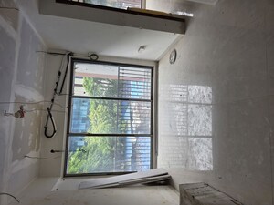 Room in 2 BHK Apartment at Crystal Paradise Residences, Andheri East – for Sale