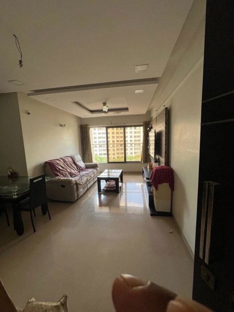 Living Room, varun-garden 2 Bedroom 1040 Sq.Ft. Apartment In Ghodbunder Road Thane 10657763