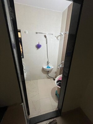 Bathroom in 2 BHK Apartment at Varun Garden, Ghodbunder Road – for Rent