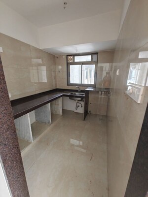 Kitchen in 2 BHK Apartment at Chandak Cornerstone, Worli – for Rent