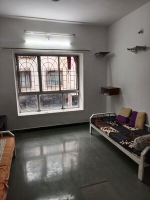 Living Room in 2 BHK Apartment at Suvarnayug Loksangam Vihar, Aundh – for Rent