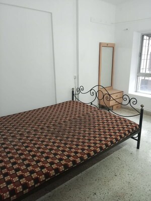 Bedroom in 2 BHK Apartment at Suvarnayug Loksangam Vihar, Aundh – for Rent