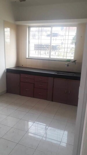 Kitchen in 2 BHK Apartment at Kumar Girija Shankar Vihar, Karve Nagar – for Rent