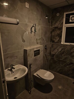 Bathroom in 3 BHK Apartment at Omaxe The Palace, Gomti Nagar – for Rent