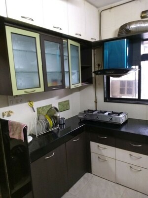 Kitchen in 2 BHK Apartment at Satellite Garden, Goregaon East – for Rent