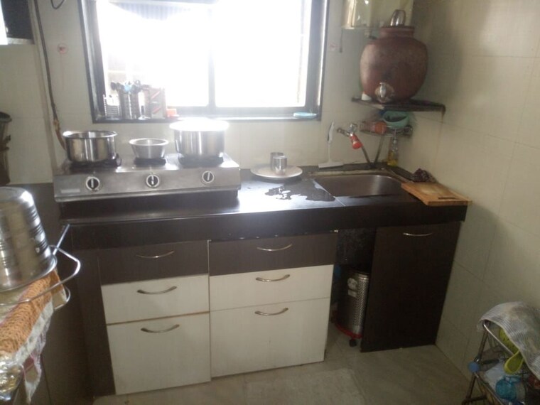 Kitchen, satellite-garden 2 Bedroom 950 Sq.Ft. Apartment In Goregaon East Mumbai 10657848