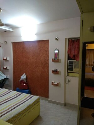 Living Room in 2 BHK Apartment at Satellite Garden, Goregaon East – for Rent
