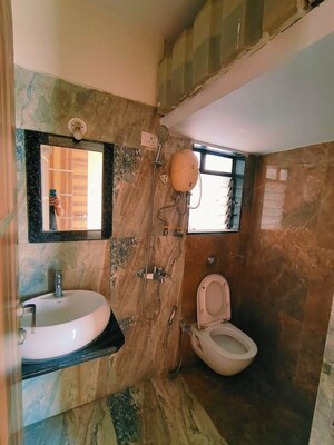 Bathroom in 2 BHK Apartment at Raj G N Residency, Mira Road – for Rent