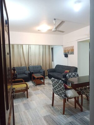Living Room in 1 BHK Apartment at Tulip CHS, Kalyani Nagar – for Rent